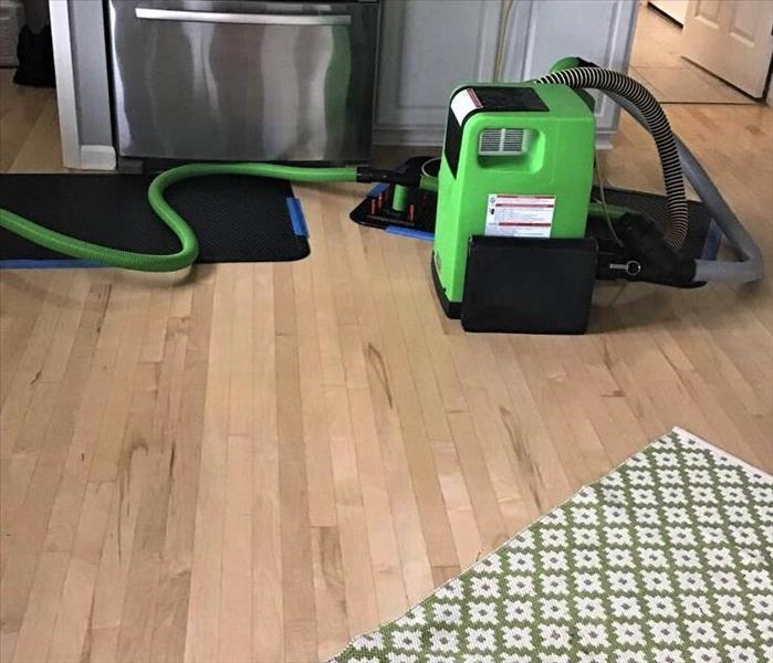 servpro floor mat systems drying water damaged wood floors