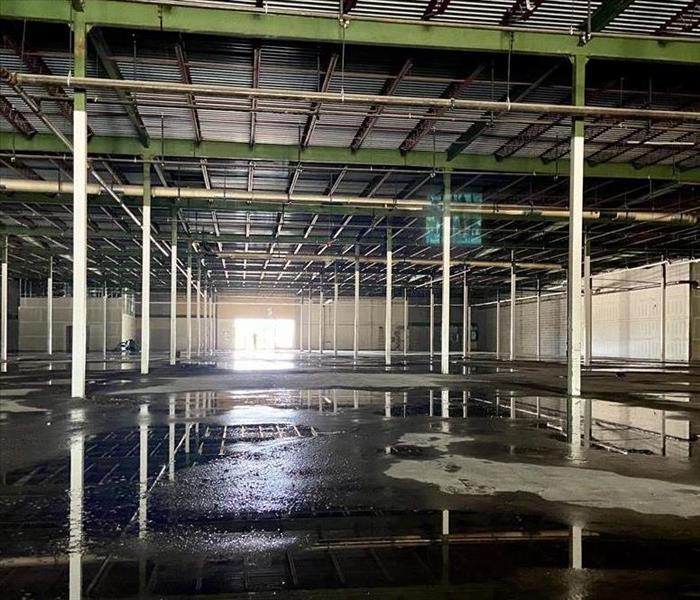 a large commercial structure with extreme water damage pre construction
