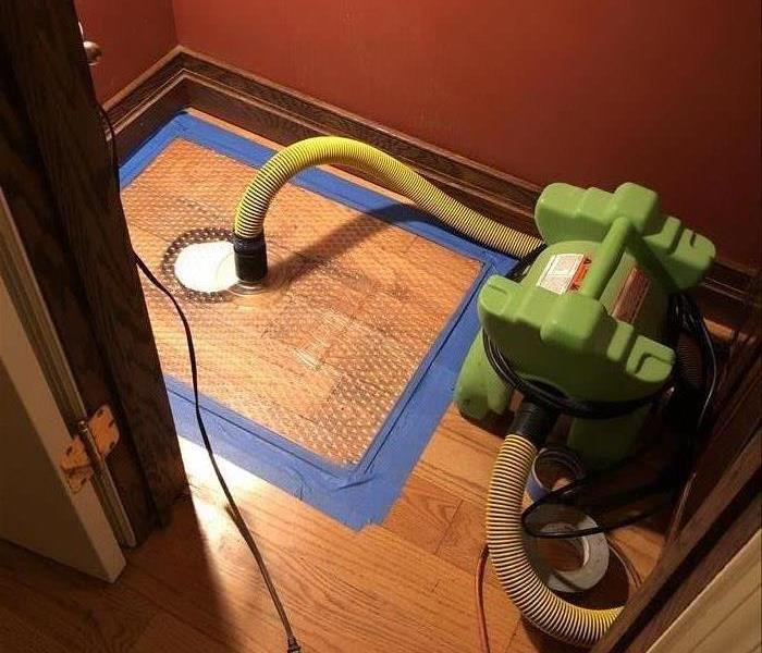 bathroom in Middleton, WI, with SERVPRO floor mat drying system 