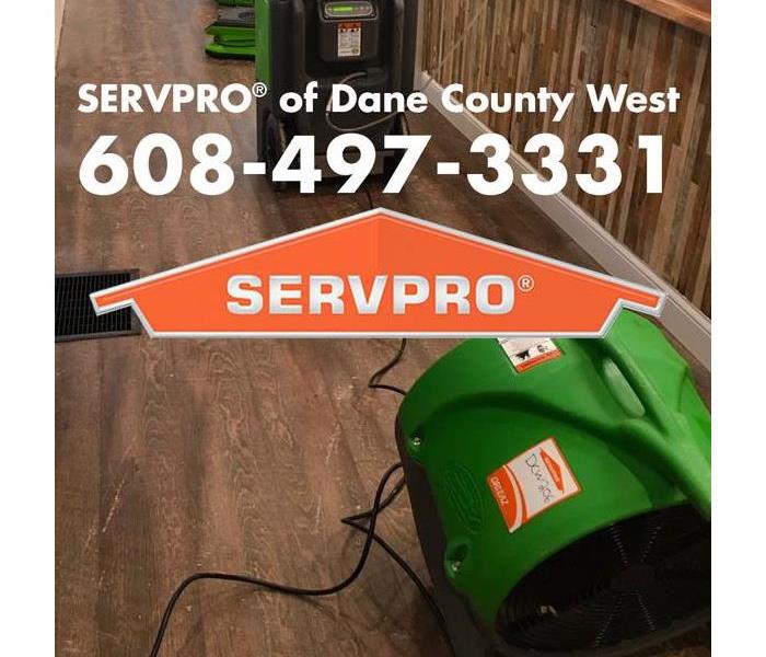 green airmovers and humidifier with SERVPRO of Dane County West logo and phone number displayed 
