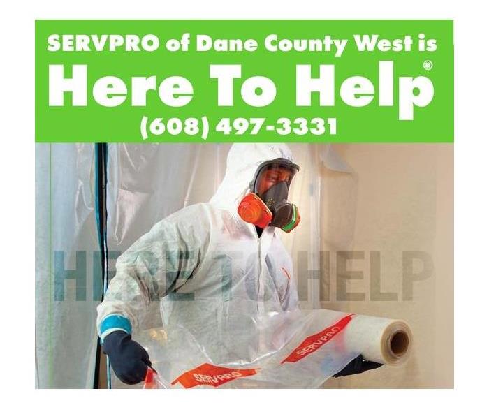 SERVPRO technician in hazmat suit for COVID-19 disinfection