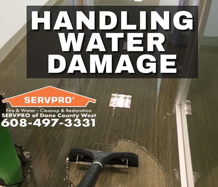 SERVPRO water extraction of a flooded floor with title "Handling Water Damage"