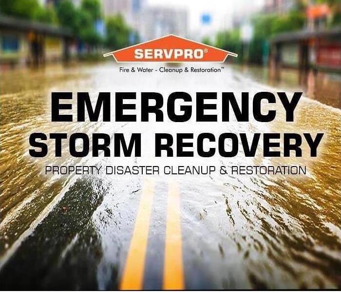 emergency storm recovery title with image of flooded street